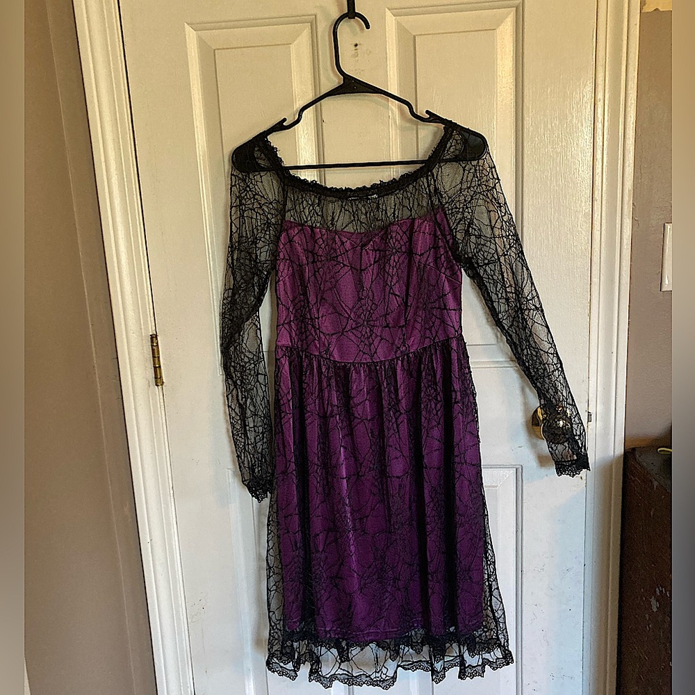 Dressfo halloween purple underlay with spider web mesh covering.